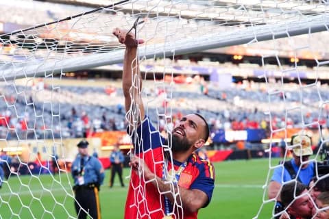 Spain's Borja Iglesias cuts down the net following the FIFA World Cup 2026 final against Argentina at the New York-New Jersey Stadium. Picture date: Sunday July 19, 2026.