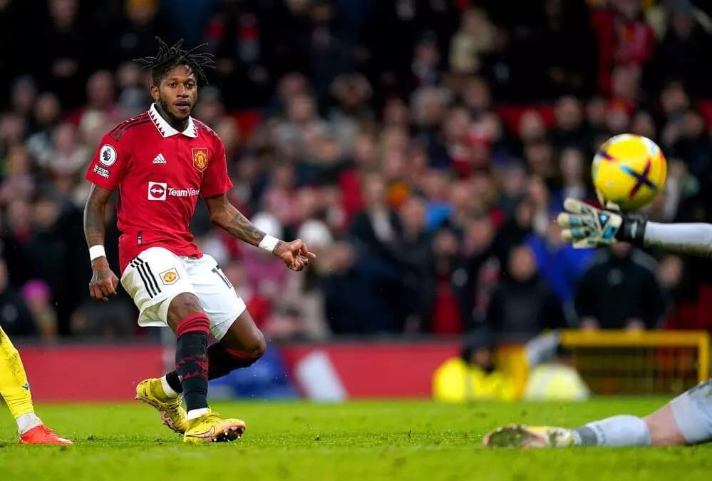Manchester United's Fred scores their side's third goal of the game during the Premier League match at Old Trafford, Manchester. Picture date: Tuesday December 27, 2022.